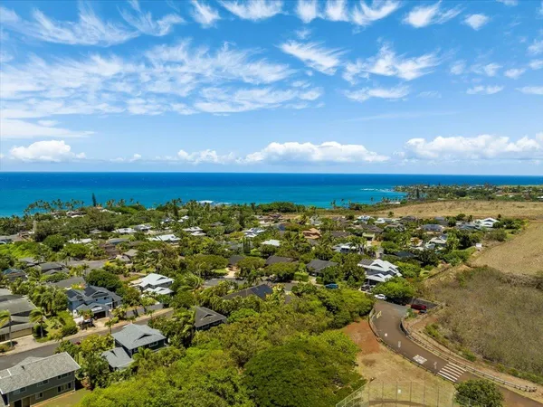 a view of a city with an ocean view