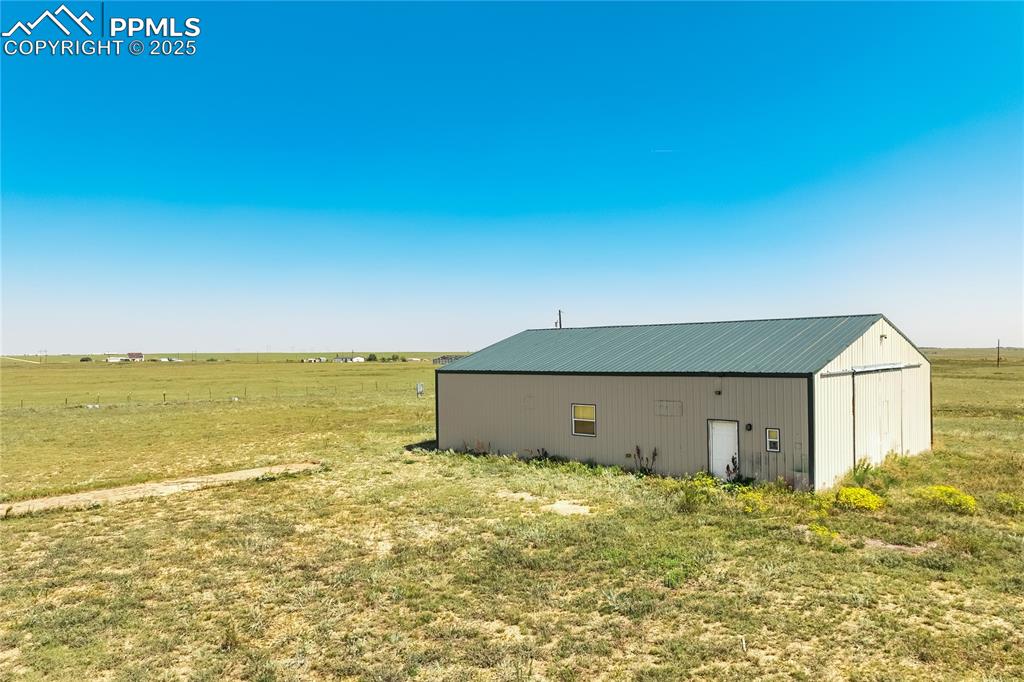 3810 Sengbeil Road Yoder, CO 80864 - Photo 23 of 42 a view of a big room with an ocean view