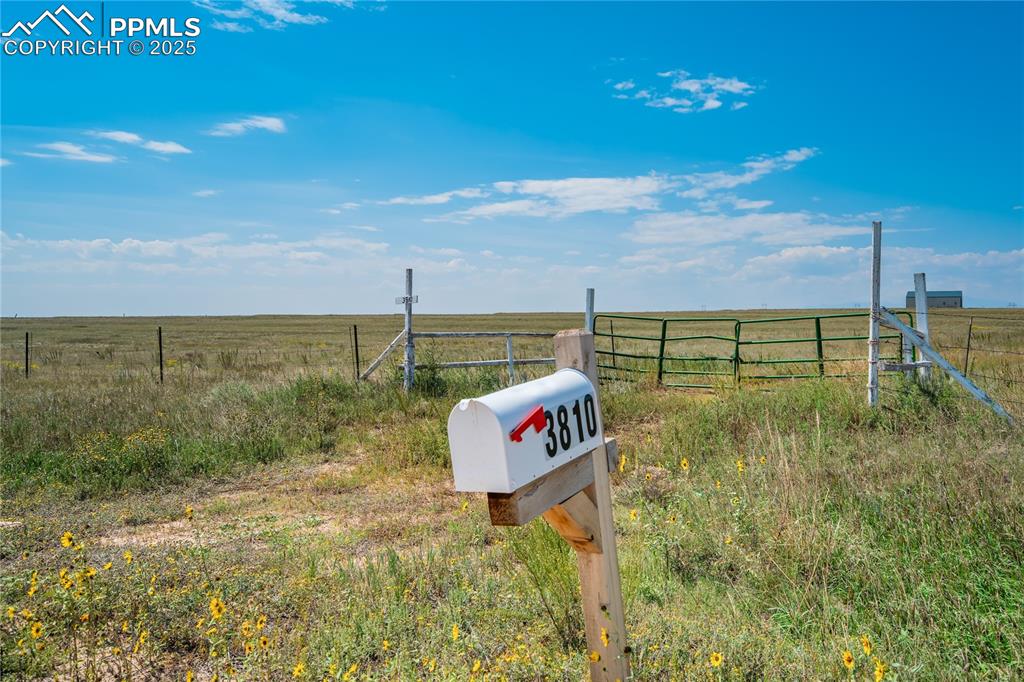 3810 Sengbeil Road Yoder, CO 80864 - Photo 6 of 42 a view of outdoor space with sign board