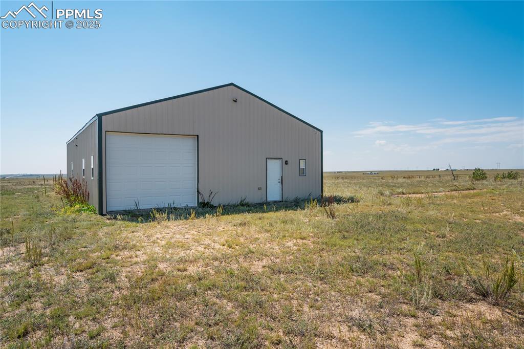 3810 Sengbeil Road Yoder, CO 80864 - Photo 7 of 42 a backyard of a house