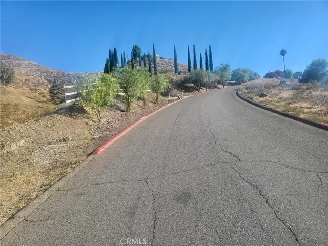 a view of a backyard of a house