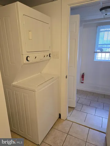 a view of a utility room with closet
