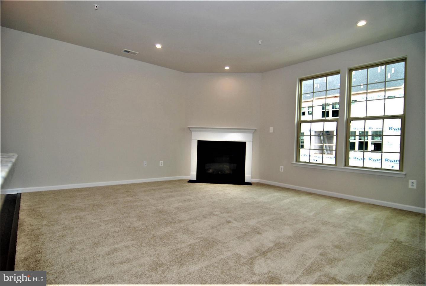 6012 Leben, Unit D Frederick, MD 21703 - Photo 6 of 18 Family room with gas fireplace