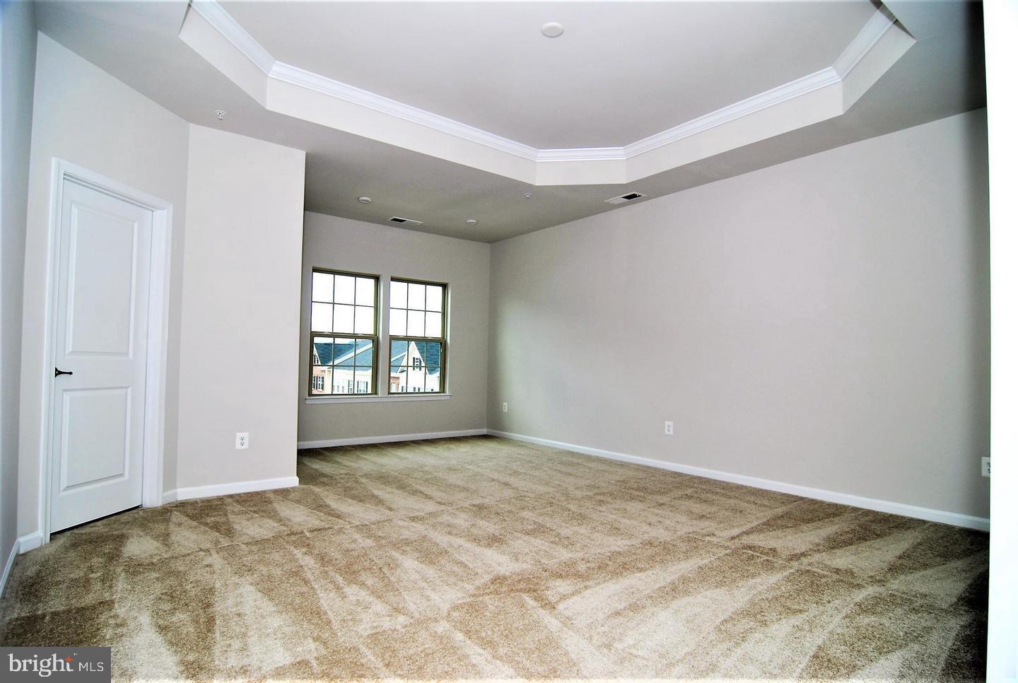 6012 Leben, Unit D Frederick, MD 21703 - Photo 9 of 18 Owner's Bedroom with Sitting Area