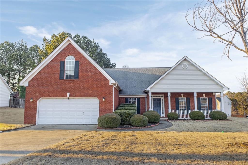 1932 Commons View Circle Snellville, GA 30078 - Photo 1 of 1 a view of a yard in front of a house