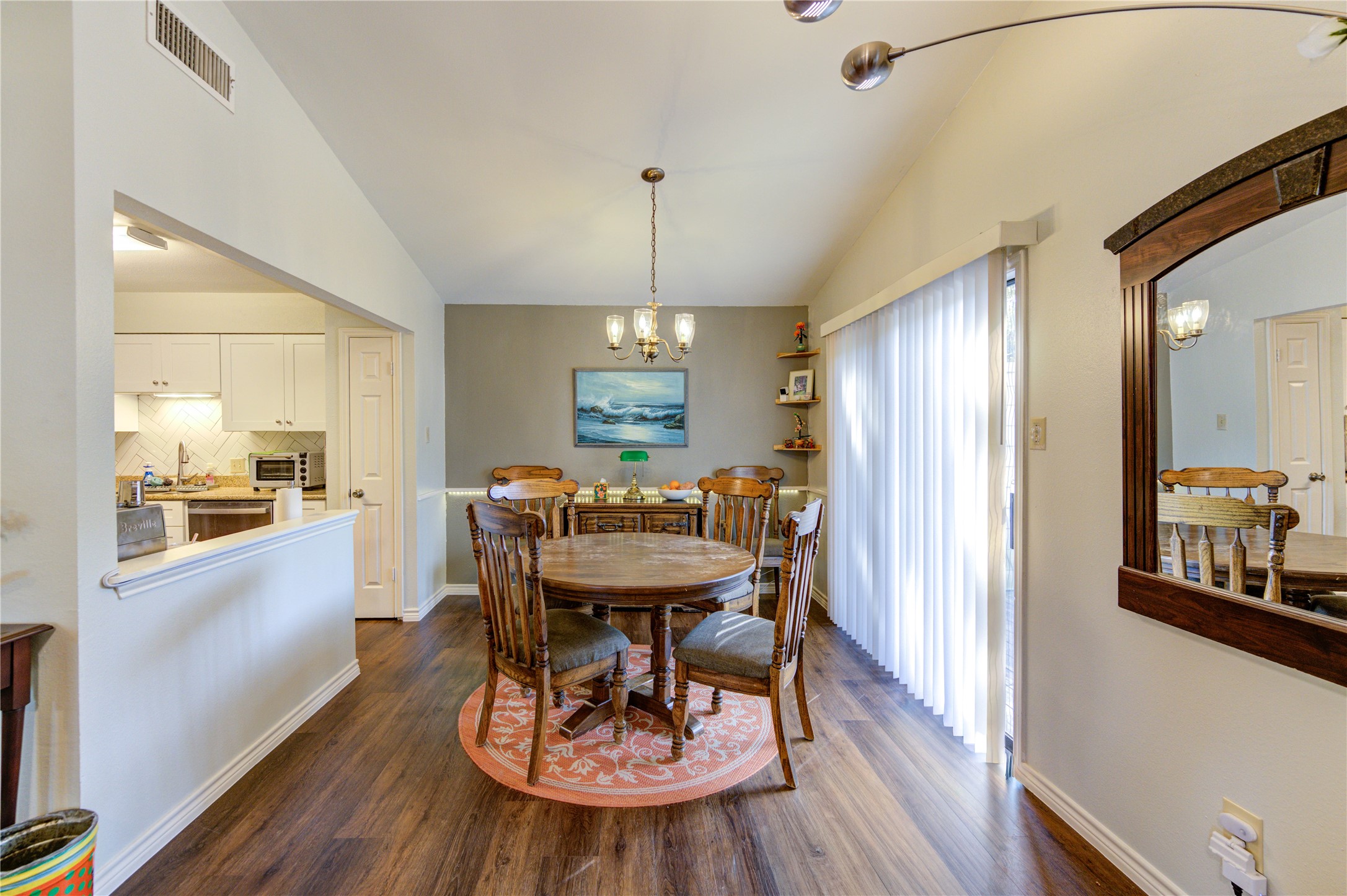 7861 Champion Pines Drive Spring, TX 77379 - Photo 7 of 34 a view of a dining room with furniture window and wooden floor