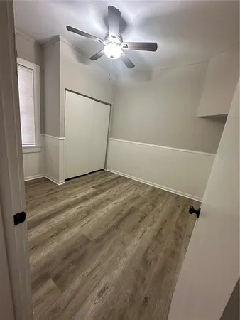 a view of a livingroom with wooden floor