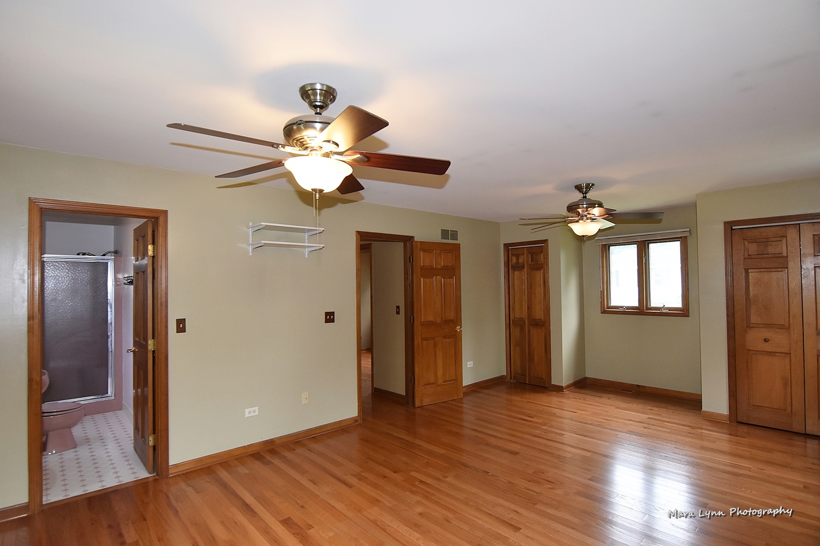 1424 Sunset Road Geneva, IL 60134 - Photo 13 of 38 a view of an empty room with wooden floor