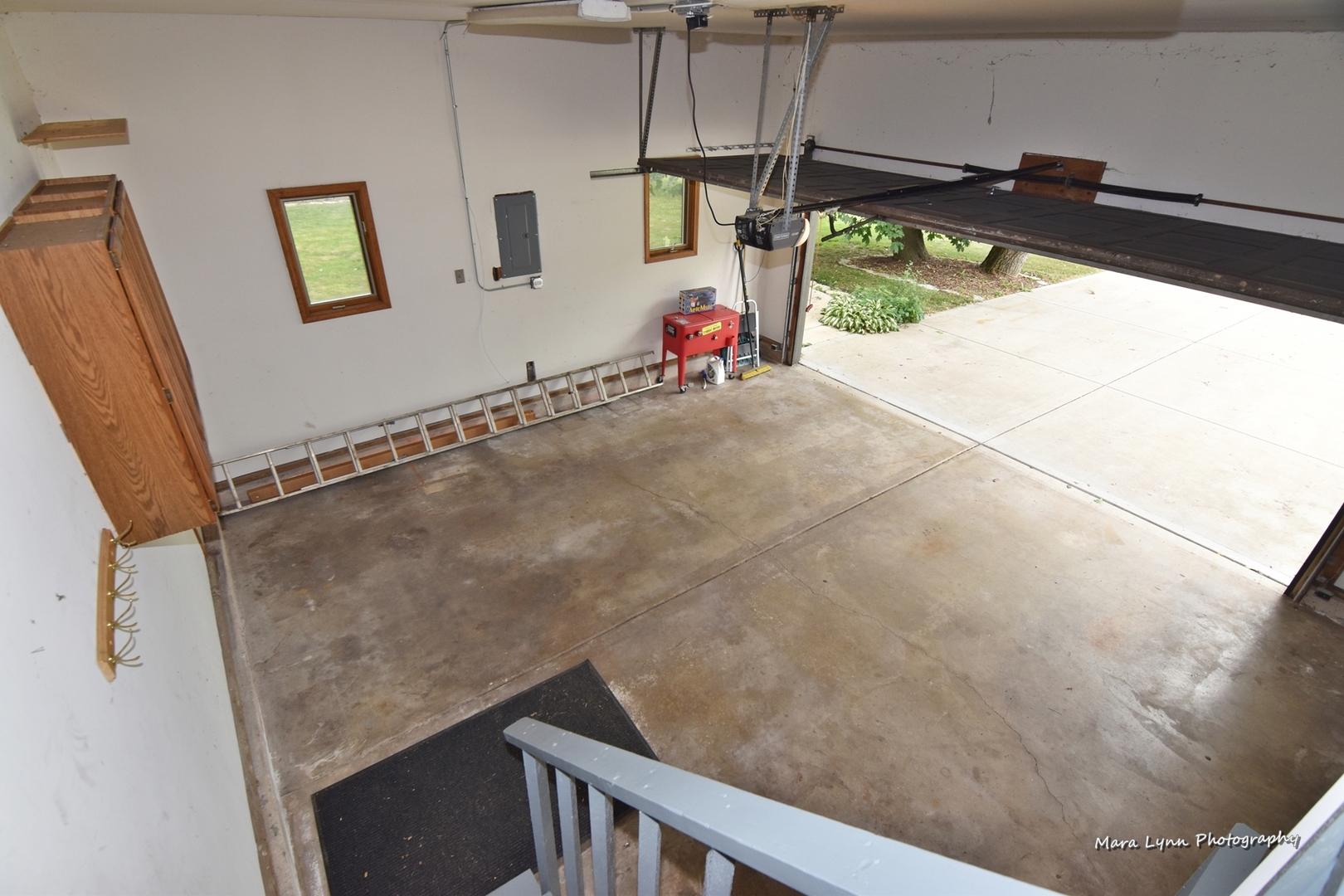 1424 Sunset Road Geneva, IL 60134 - Photo 31 of 38 a view of a room with wooden floor and windows