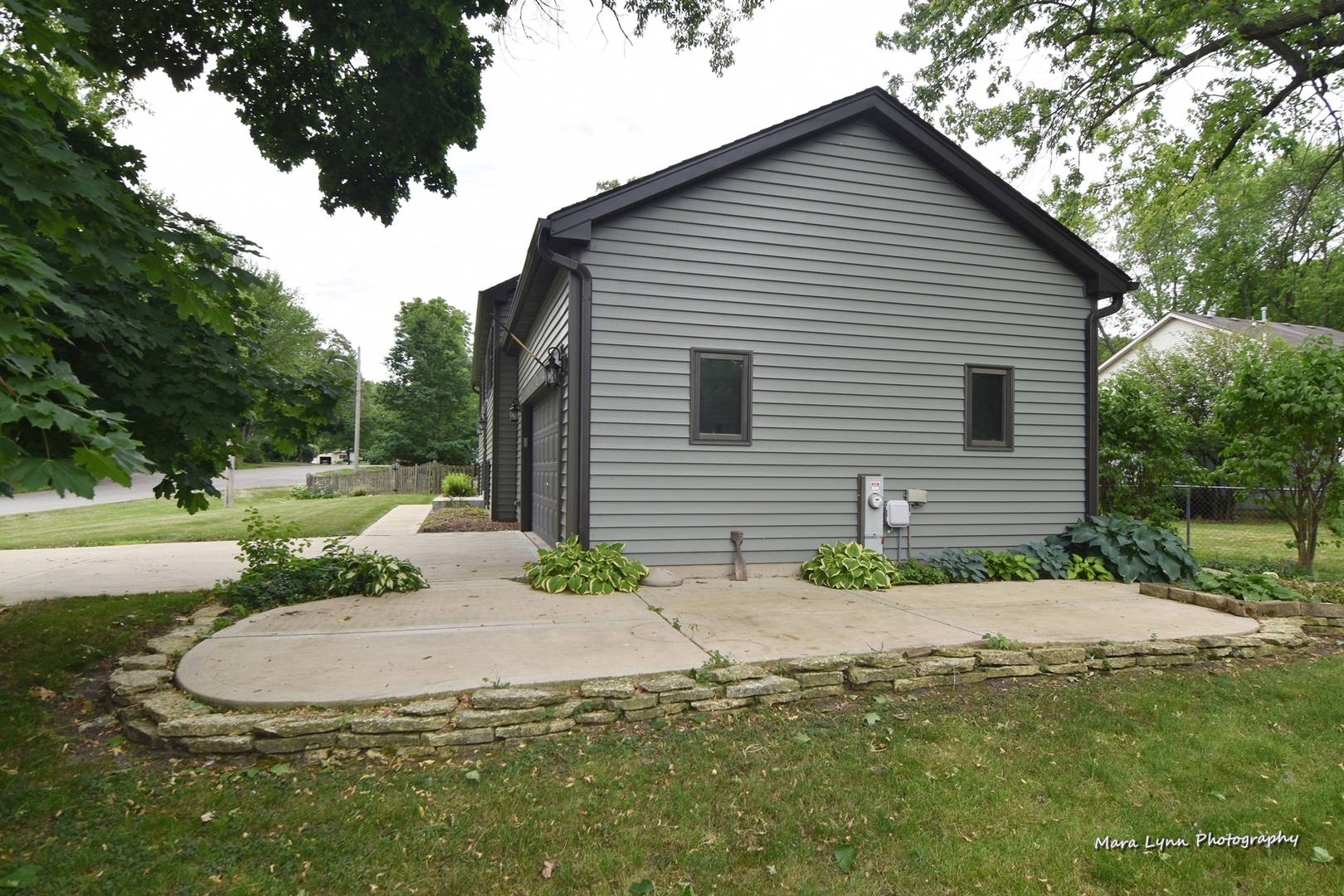 1424 Sunset Road Geneva, IL 60134 - Photo 33 of 38 a house view with a backyard space