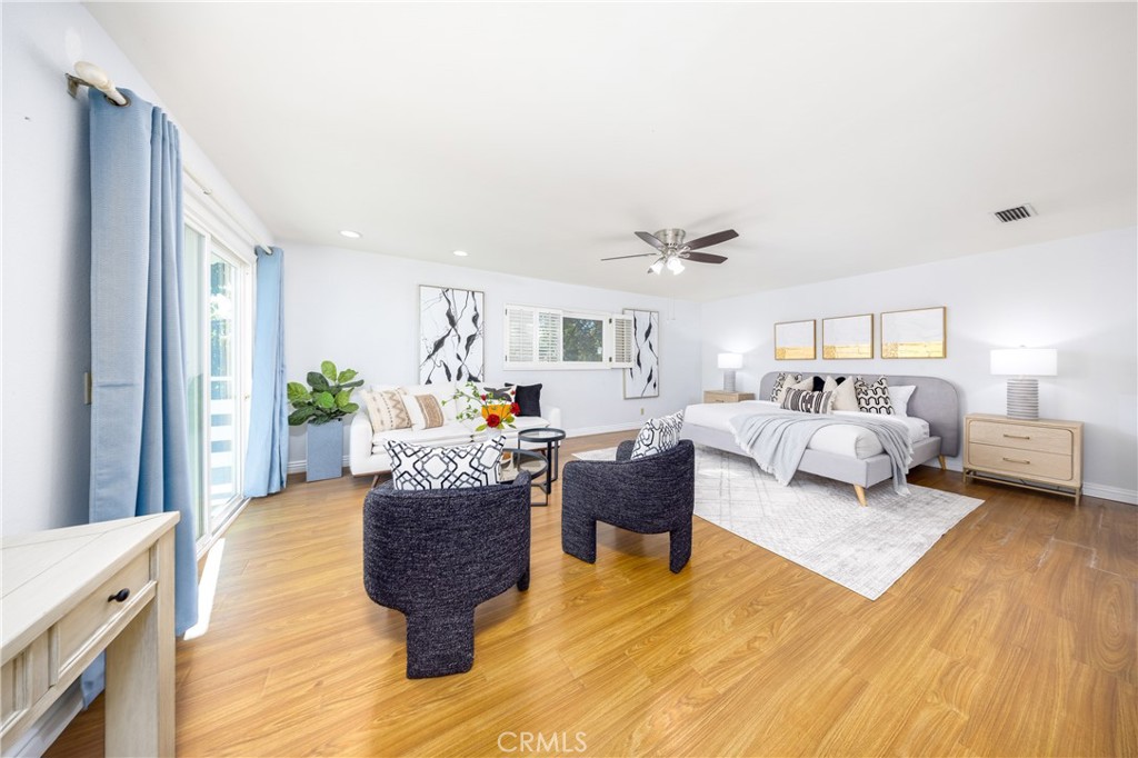 648 Sharon Road Arcadia, CA 91007 - Photo 16 of 26 a living room with furniture and a wooden floor