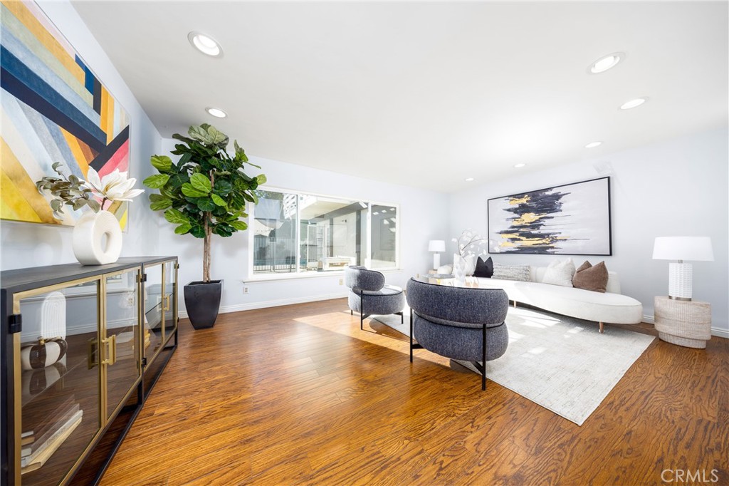 648 Sharon Road Arcadia, CA 91007 - Photo 10 of 26 a living room with furniture and a large window