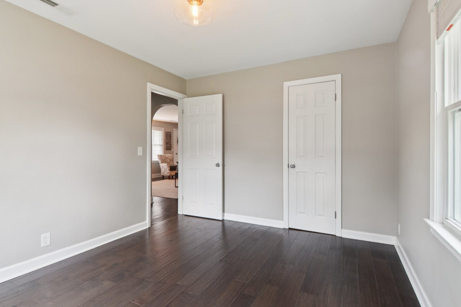 19309 Wolf Road Mokena, IL 60448 - Photo 18 of 37 a view of an empty room with wooden floor and a window