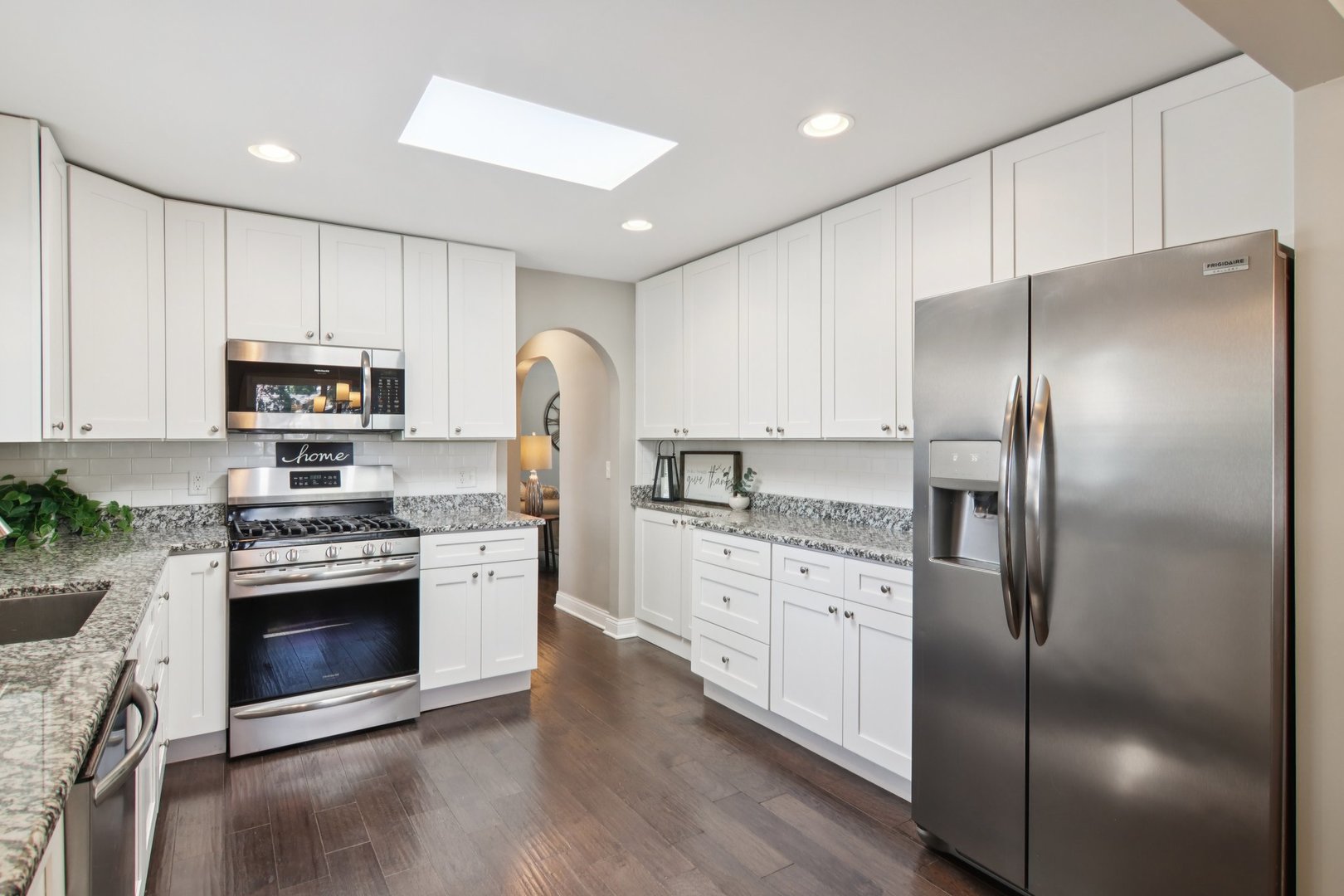 19309 Wolf Road Mokena, IL 60448 - Photo 9 of 37 a kitchen with stainless steel appliances granite countertop a stove a refrigerator and a stove
