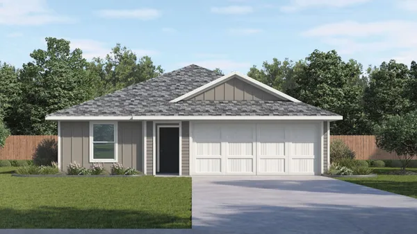 front view of a house with a yard
