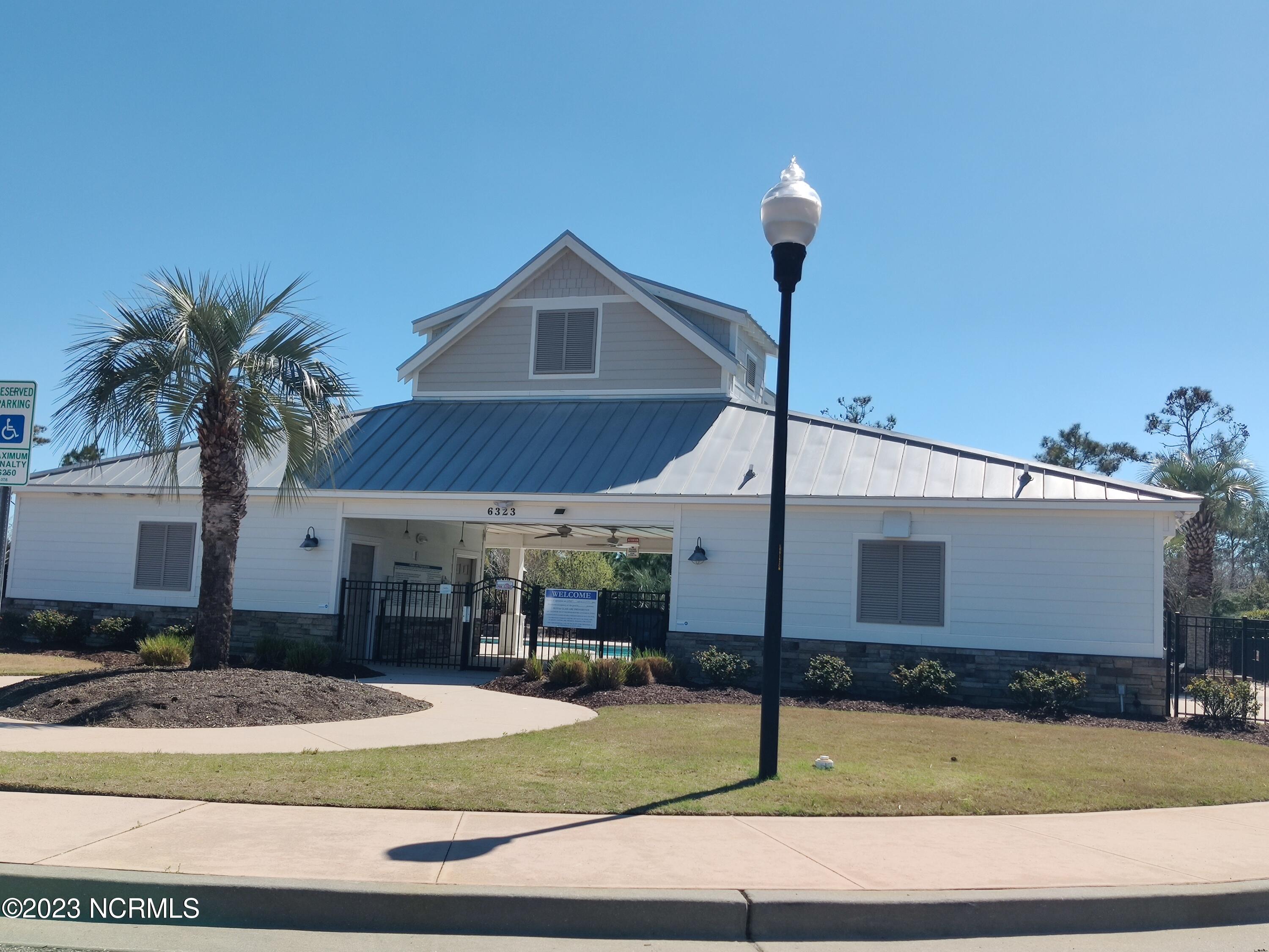 1423 Long Pond Road Southwest Ocean Isle Beach, NC 28469 - Photo 52 of 57 Community amenity -- pool and cabana area with grill available