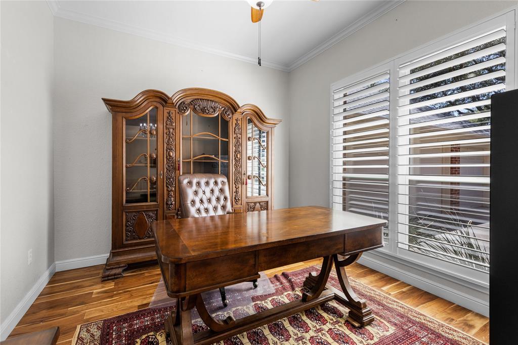 1007 Santa Fe Street Denton, TX 76205 - Photo 5 of 37 Office with ornamental molding, could also be living room wood finished floors, and ceiling fan
