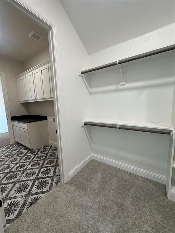 108 Blackstar Lane Decatur, TX 76234 - Photo 26 of 37 Primary Closet Adjoins Laundry Room