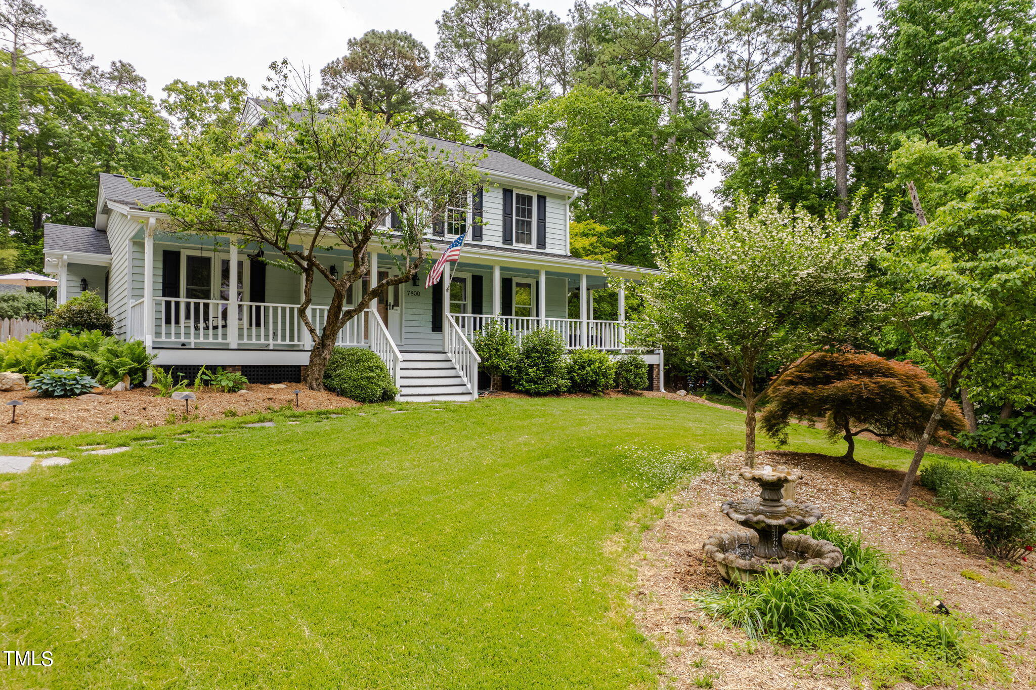 7800 Whitley Drive Raleigh, NC 27613 - Photo 1 of 17 a house view with a garden space