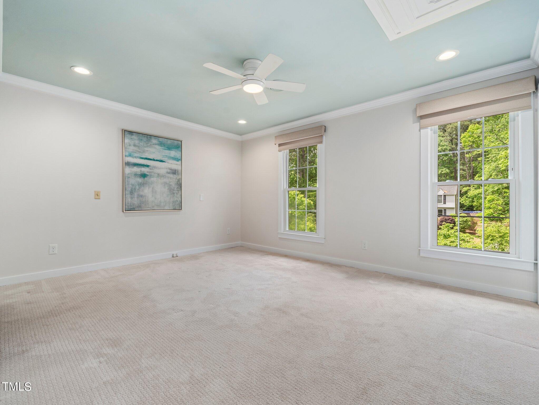 7800 Whitley Drive Raleigh, NC 27613 - Photo 8 of 17 an empty room with windows and closet