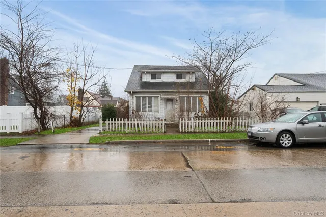 a view of street with parked cars