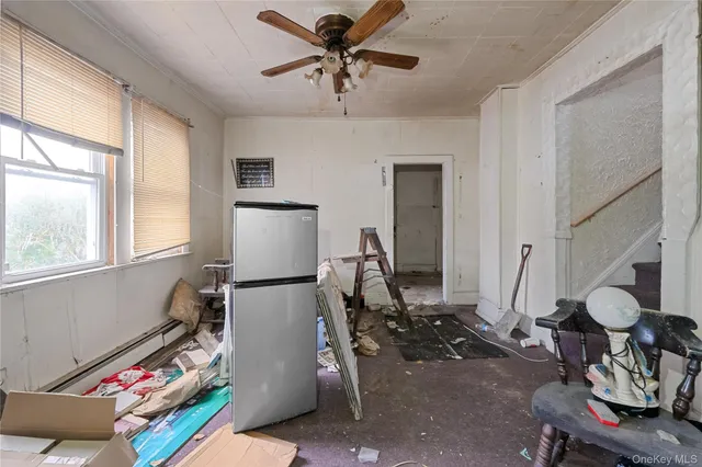 a room with furniture and a window