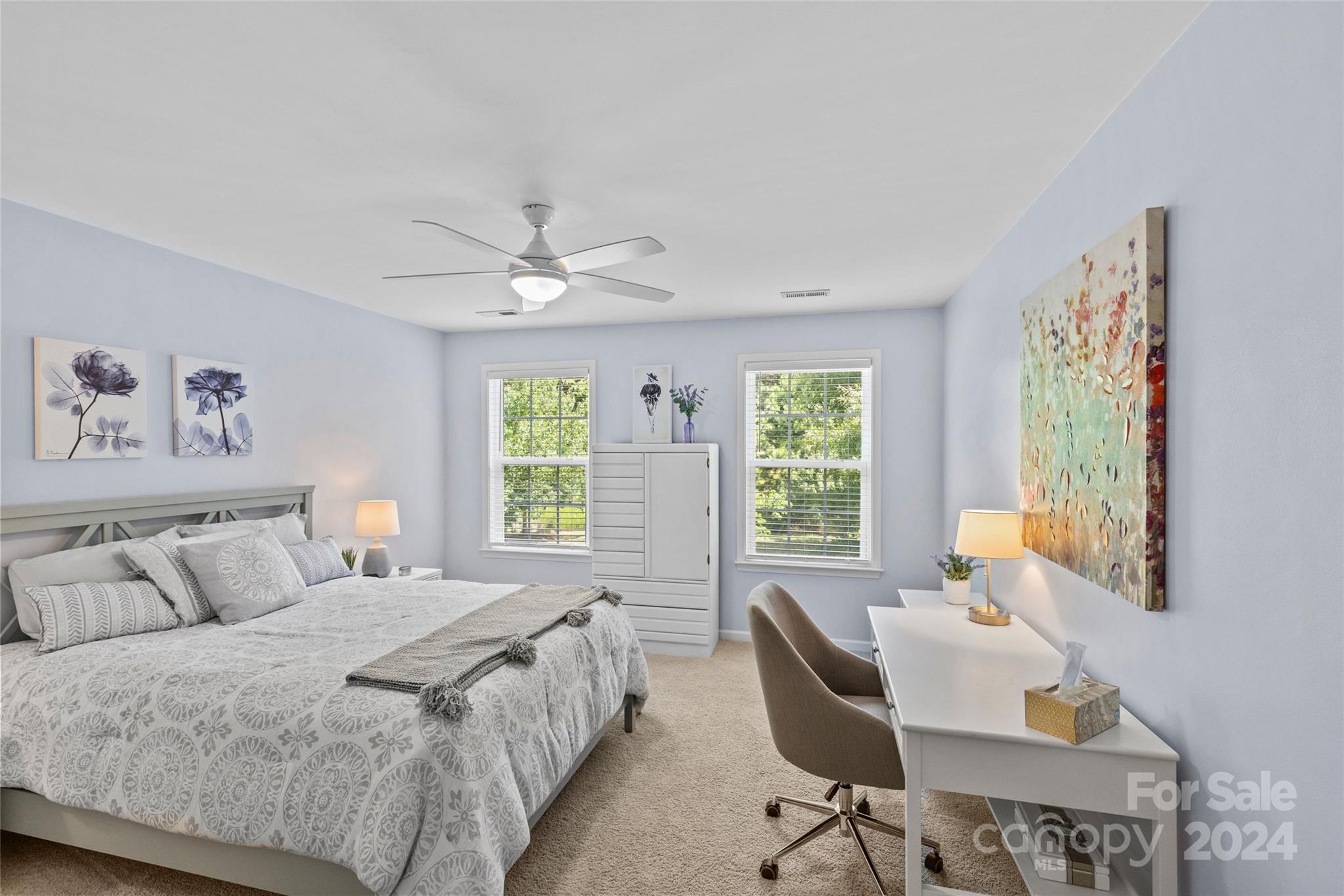 1034 Silver Gull Drive Tega Cay, SC 29708 - Photo 20 of 32 a bedroom with a bed and a large window