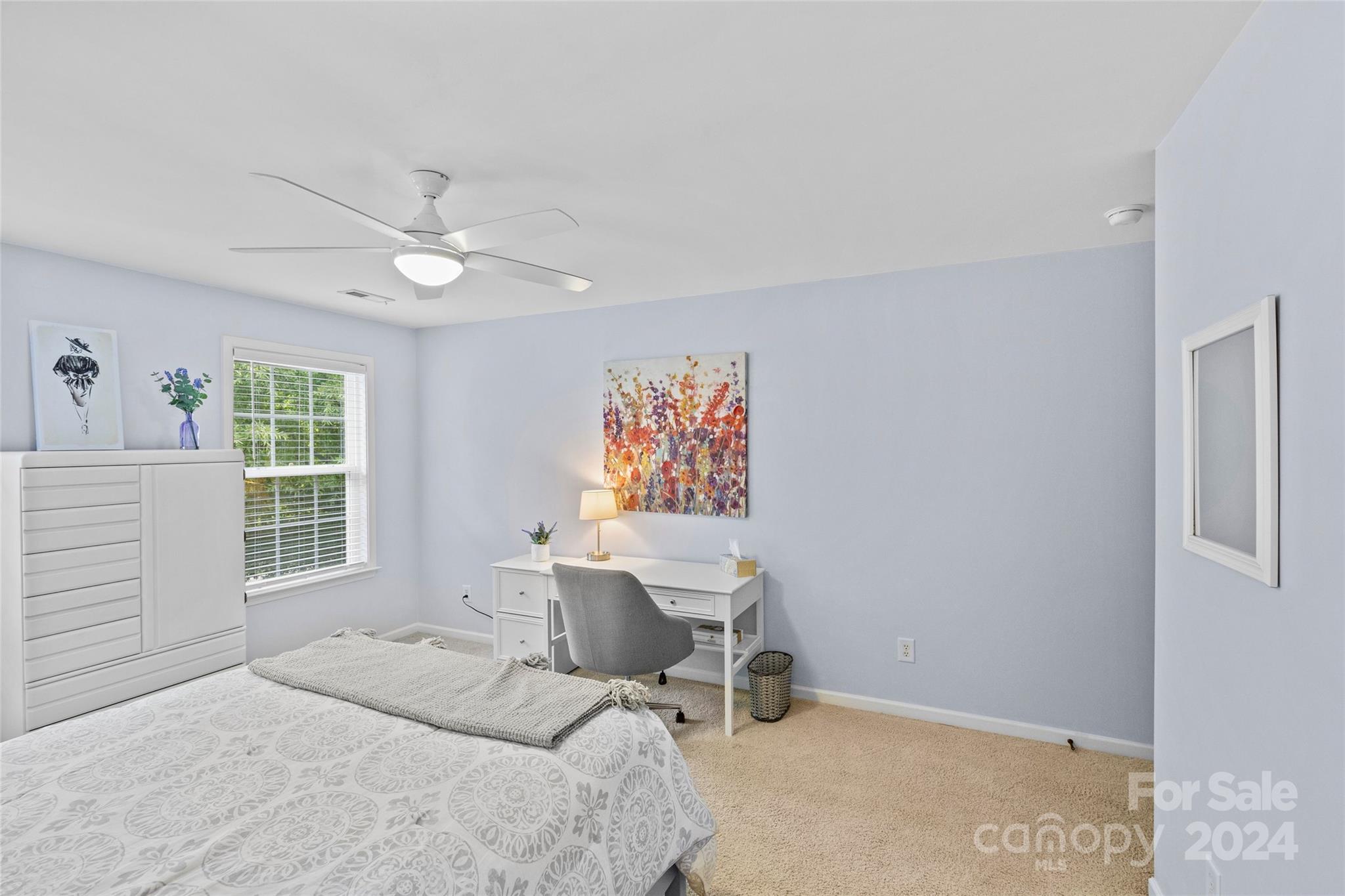 1034 Silver Gull Drive Tega Cay, SC 29708 - Photo 21 of 32 a bedroom with a bed and a window