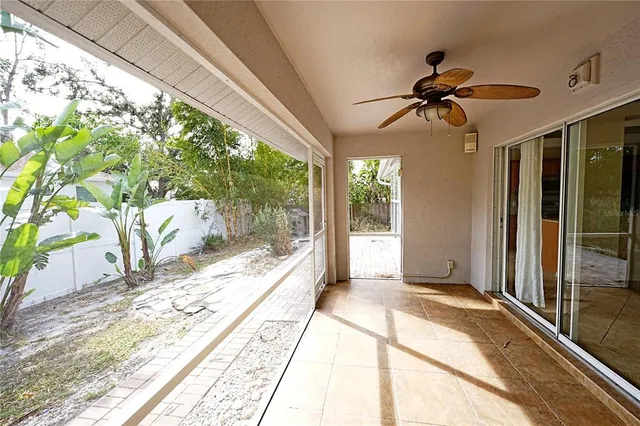 a view of a backyard of the house
