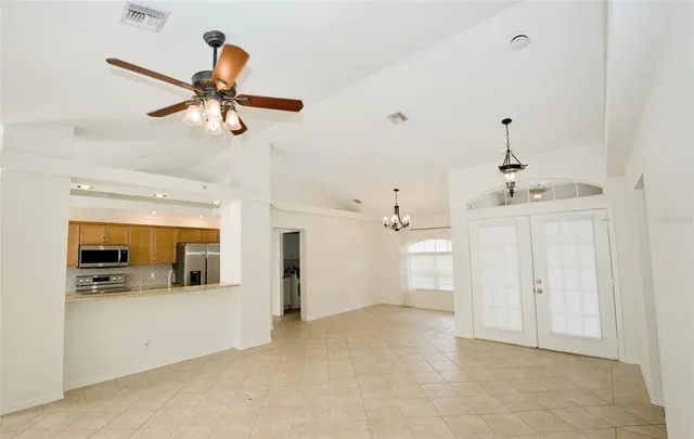 a view of a kitchen with a sink and cabinet