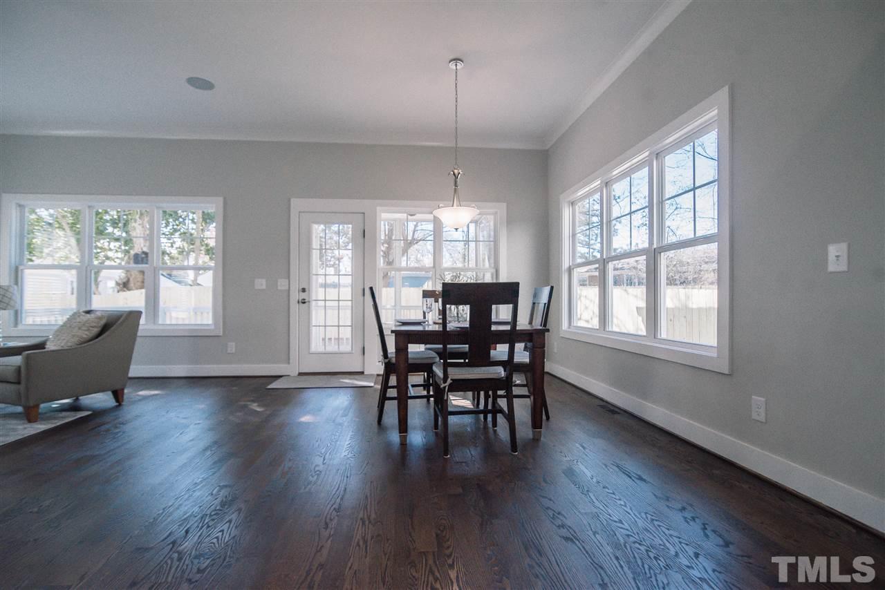 1508 East Lane Street Raleigh, NC 27610 - Photo 19 of 30 a dining room with furniture window wooden floor
