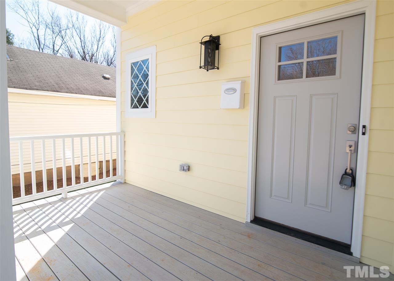 1508 East Lane Street Raleigh, NC 27610 - Photo 3 of 30 a view of a porch with wooden floor