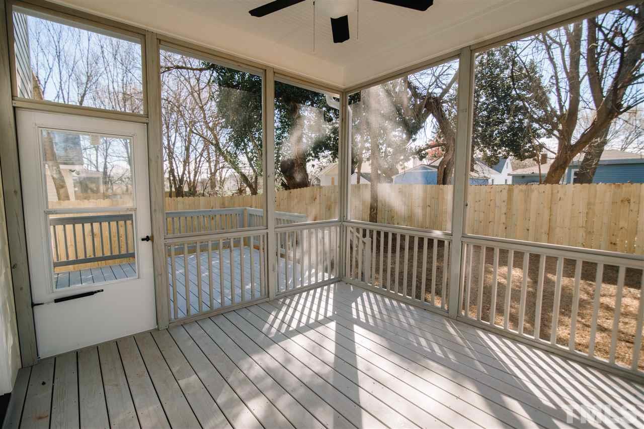 1508 East Lane Street Raleigh, NC 27610 - Photo 28 of 30 a view of a balcony with wooden floor