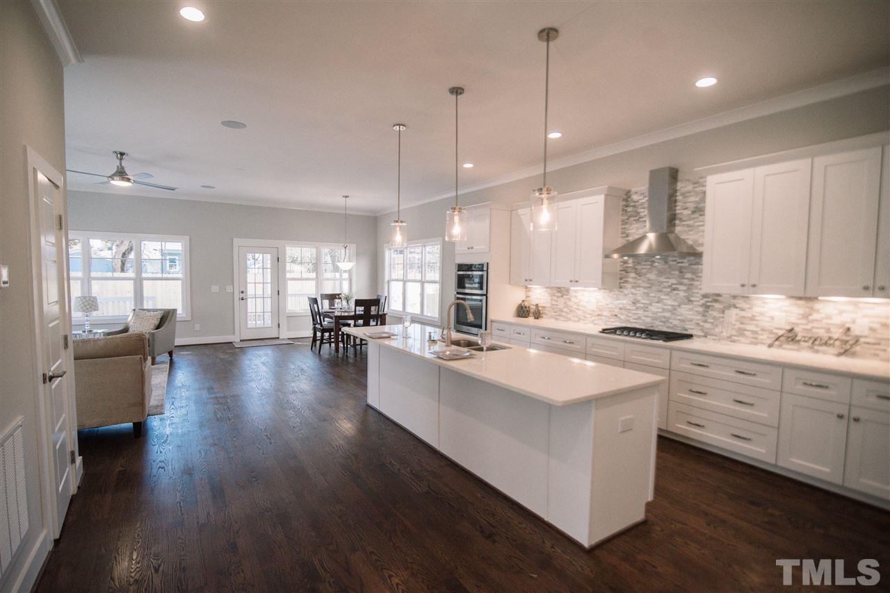 1508 East Lane Street Raleigh, NC 27610 - Photo 6 of 30 a large kitchen with a lot of counter space