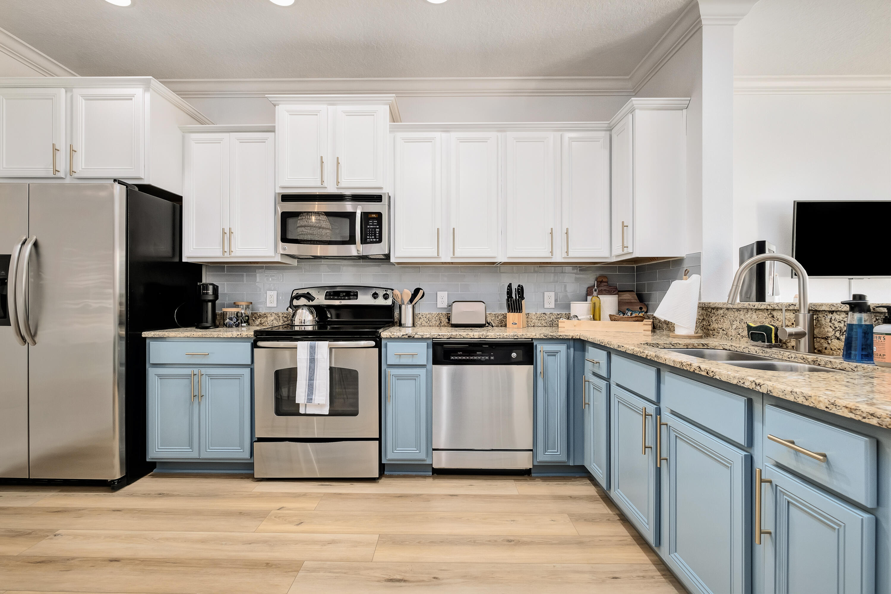 44 St Vincent Lane Inlet Beach, FL 32461 - Photo 13 of 45 a kitchen with granite countertop a refrigerator stove and sink