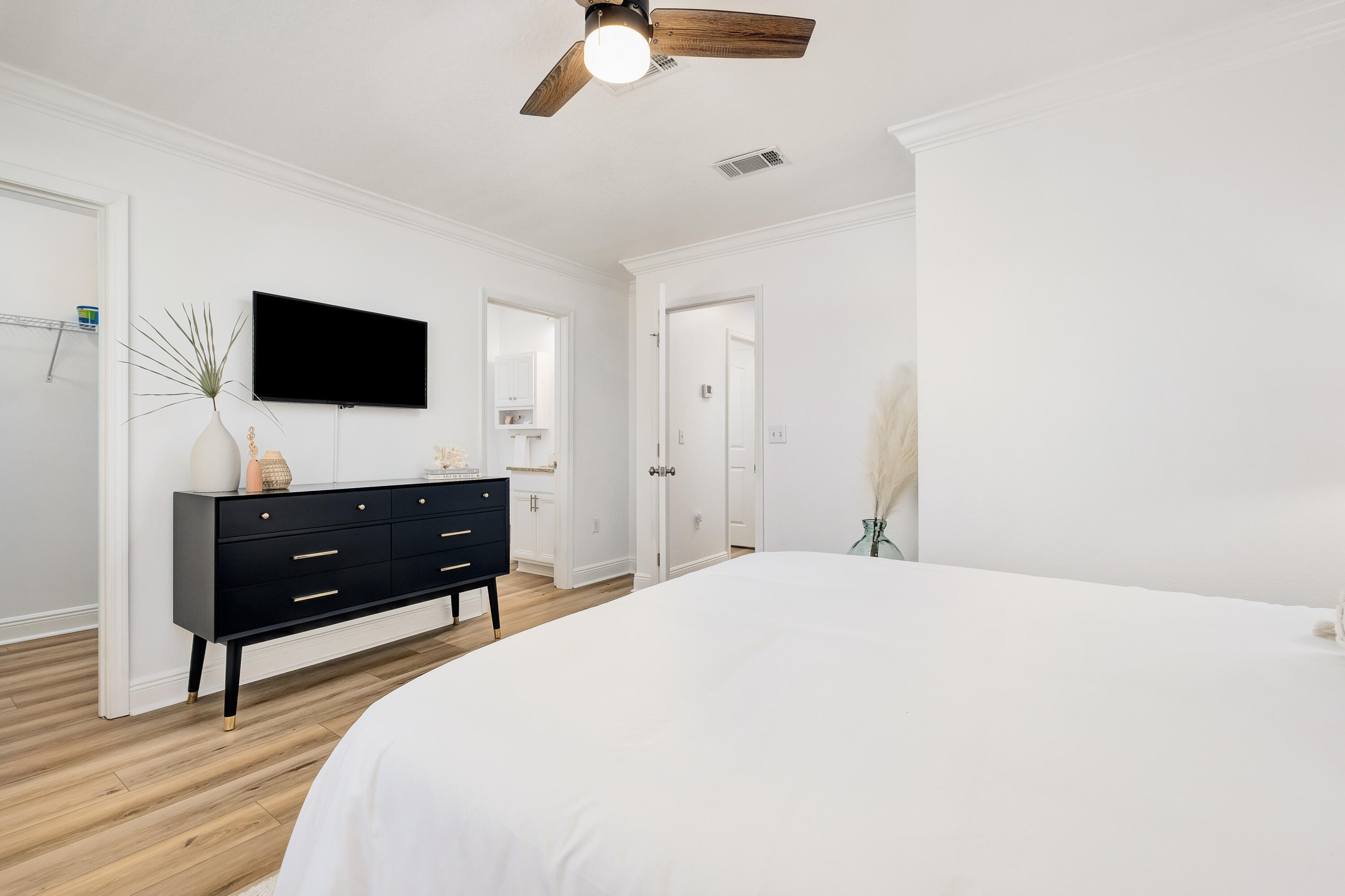 44 St Vincent Lane Inlet Beach, FL 32461 - Photo 23 of 45 a bedroom with a bed and a flat screen tv