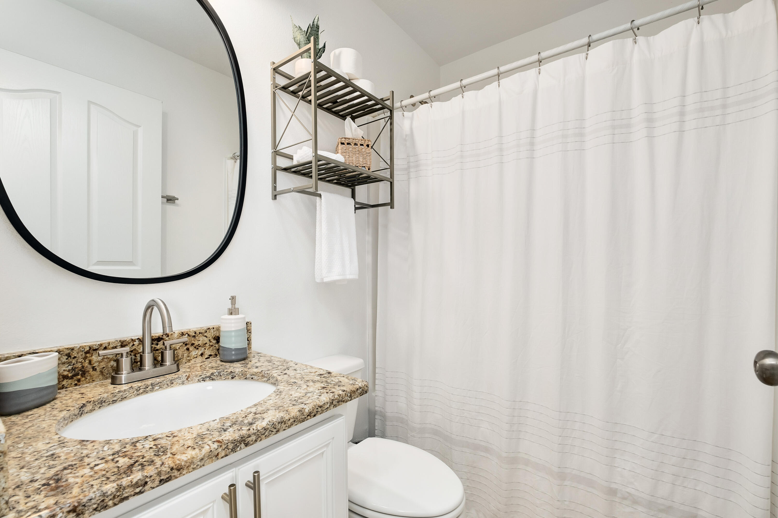 44 St Vincent Lane Inlet Beach, FL 32461 - Photo 26 of 45 a bathroom with a granite countertop sink and a mirror