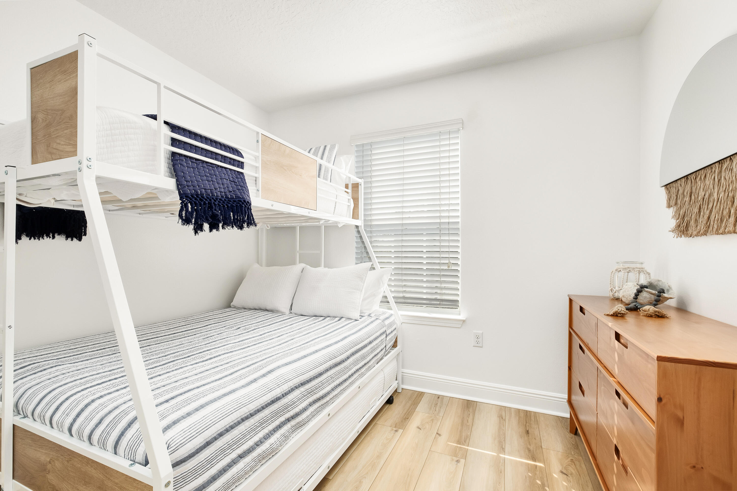 44 St Vincent Lane Inlet Beach, FL 32461 - Photo 27 of 45 a bedroom with a bed a flat screen tv and a window