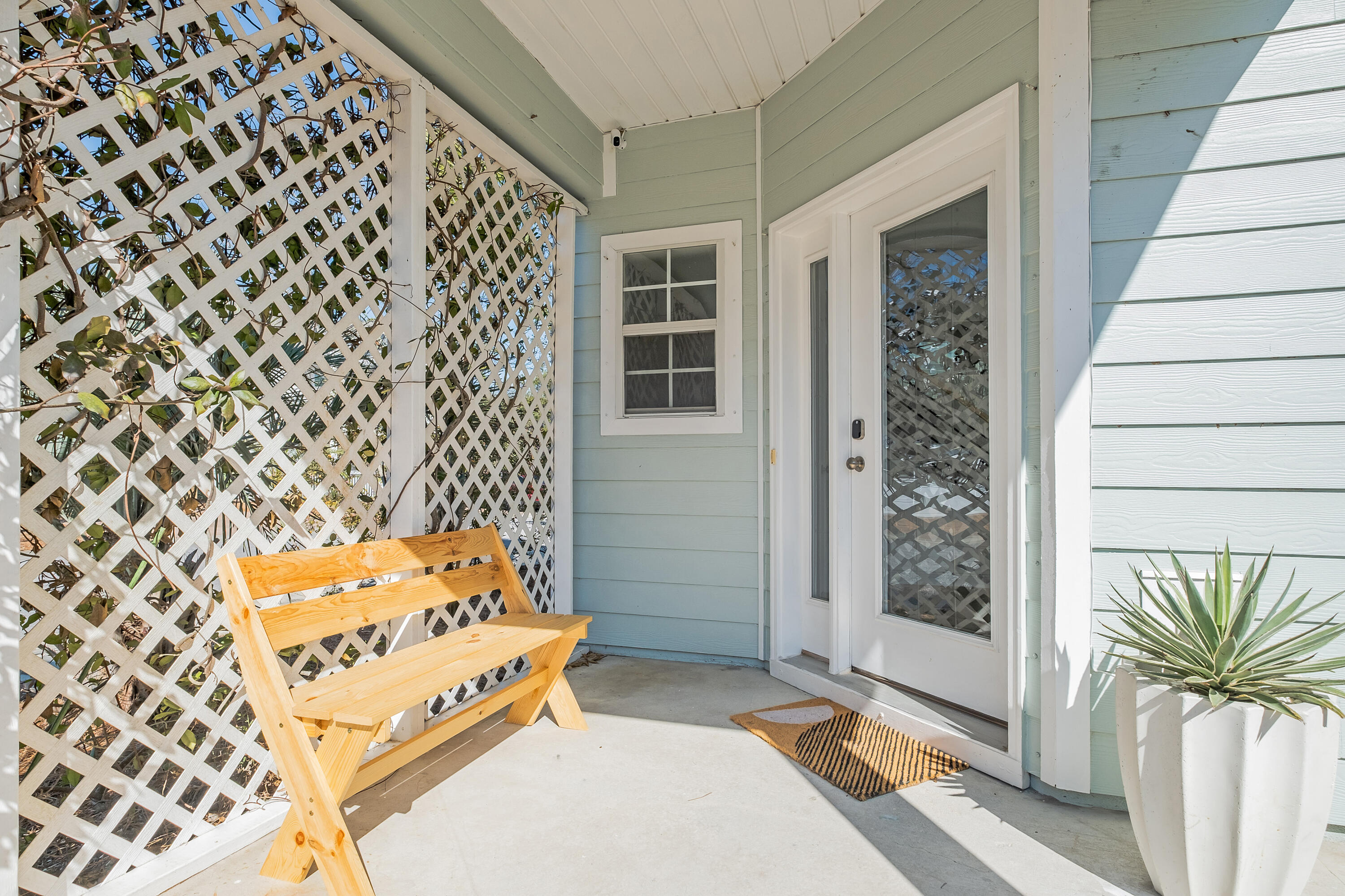 44 St Vincent Lane Inlet Beach, FL 32461 - Photo 32 of 45 a bedroom with a bed and a painting on the wall
