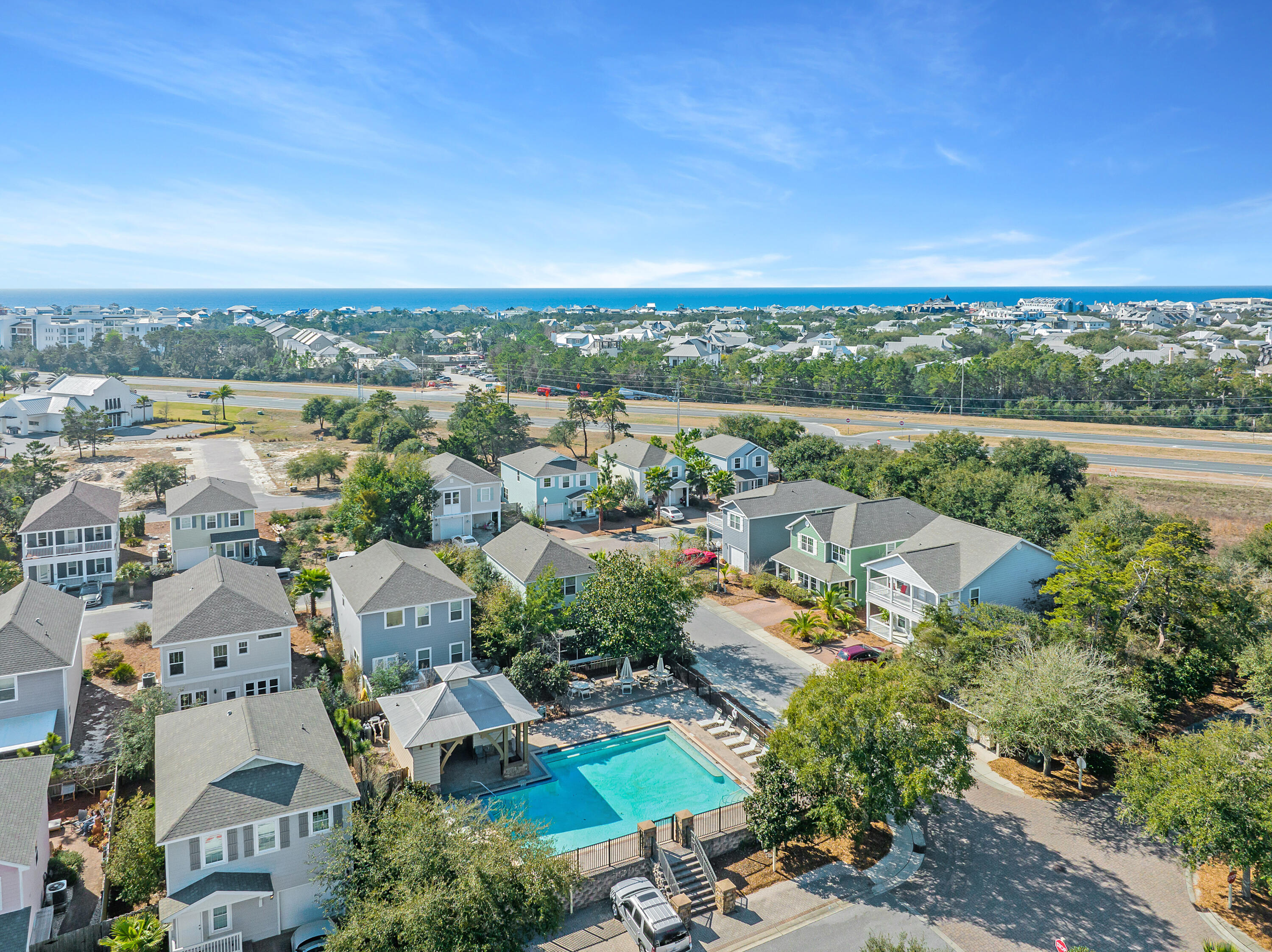 44 St Vincent Lane Inlet Beach, FL 32461 - Photo 39 of 45 an aerial view of a city with lots of residential buildings ocean and mountain view in back
