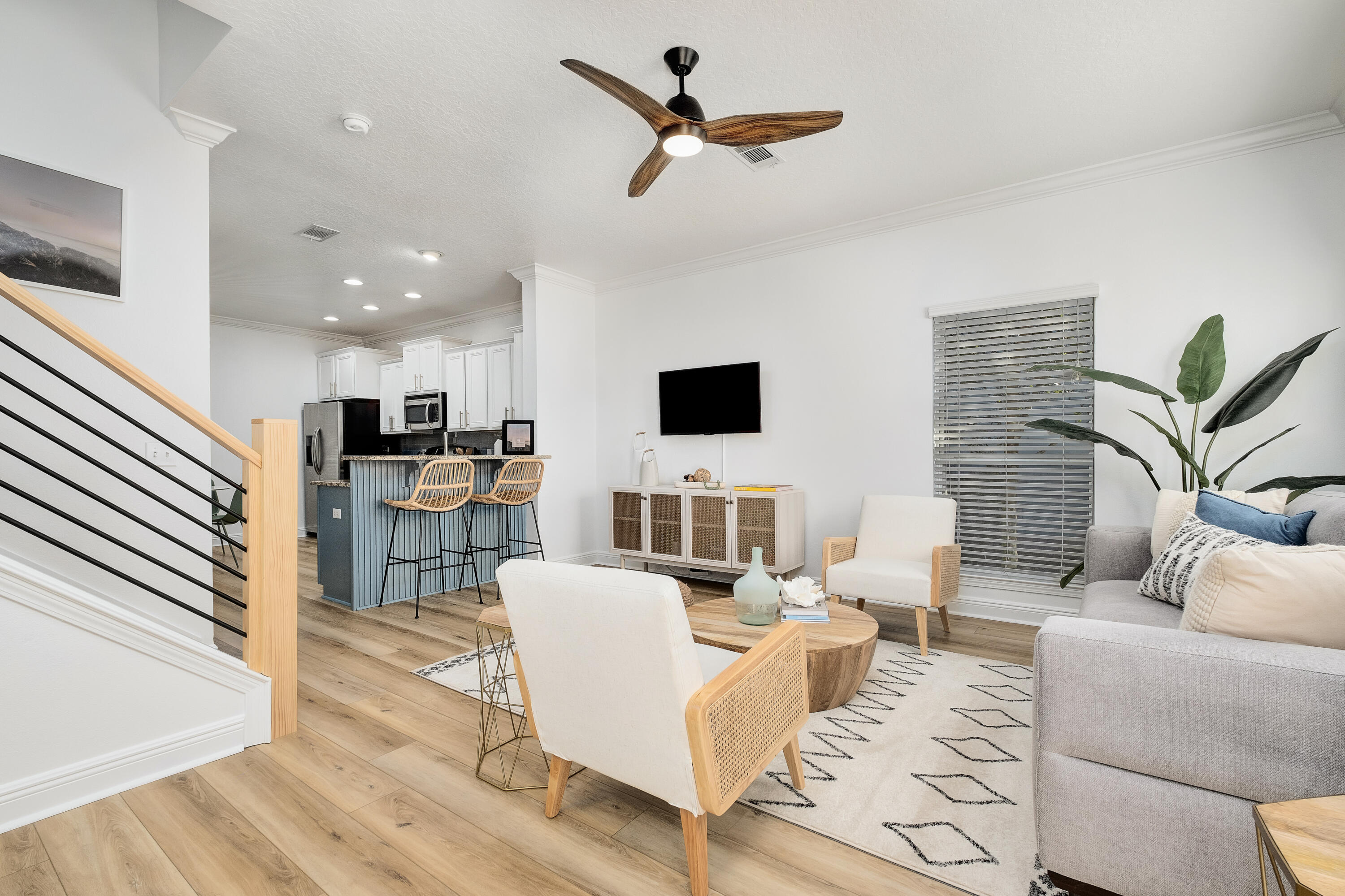 44 St Vincent Lane Inlet Beach, FL 32461 - Photo 10 of 45 a living room with furniture kitchen view and a flat screen tv