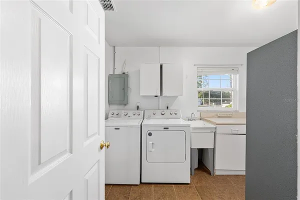 a view of bathroom with dual sinks