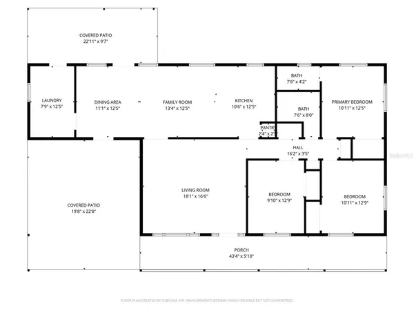 a picture of a wall with a white building and a white wall