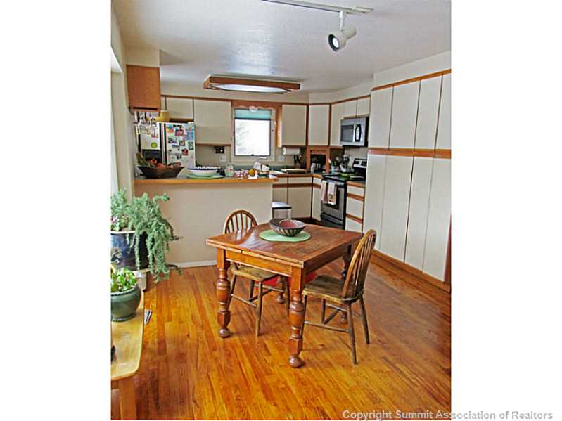 192 Alpine Road Dillon, CO 80435 - Photo 2 of 23 Dining Room. Wood floors in dining & kitchen w/ lots of sun