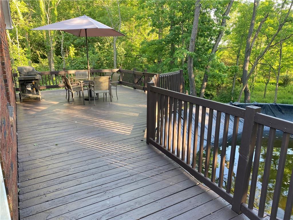 881 Mercer Road Greenville, PA 16125 - Photo 18 of 19 a view of balcony with outdoor seating and wooden floor