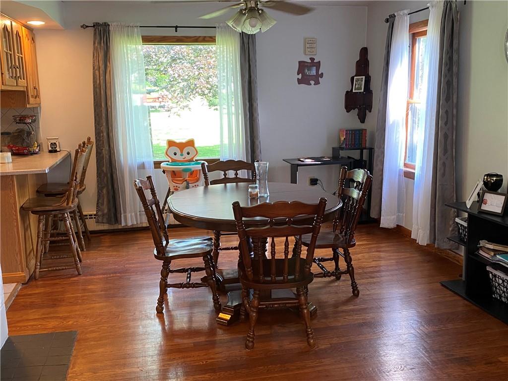 881 Mercer Road Greenville, PA 16125 - Photo 8 of 19 a dining room with furniture window wooden floor