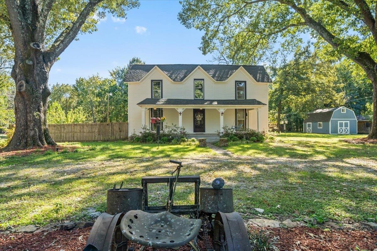 9301 Osborn Road Arlington, TN 38002 - Photo 1 of 31 a view of a house with a yard