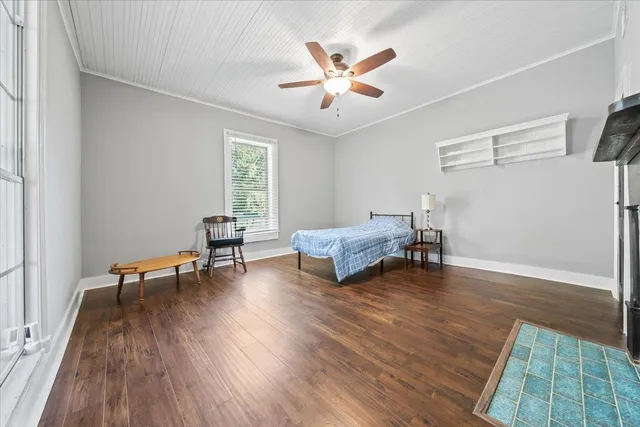 a bathroom with a granite countertop sink mirror and shower