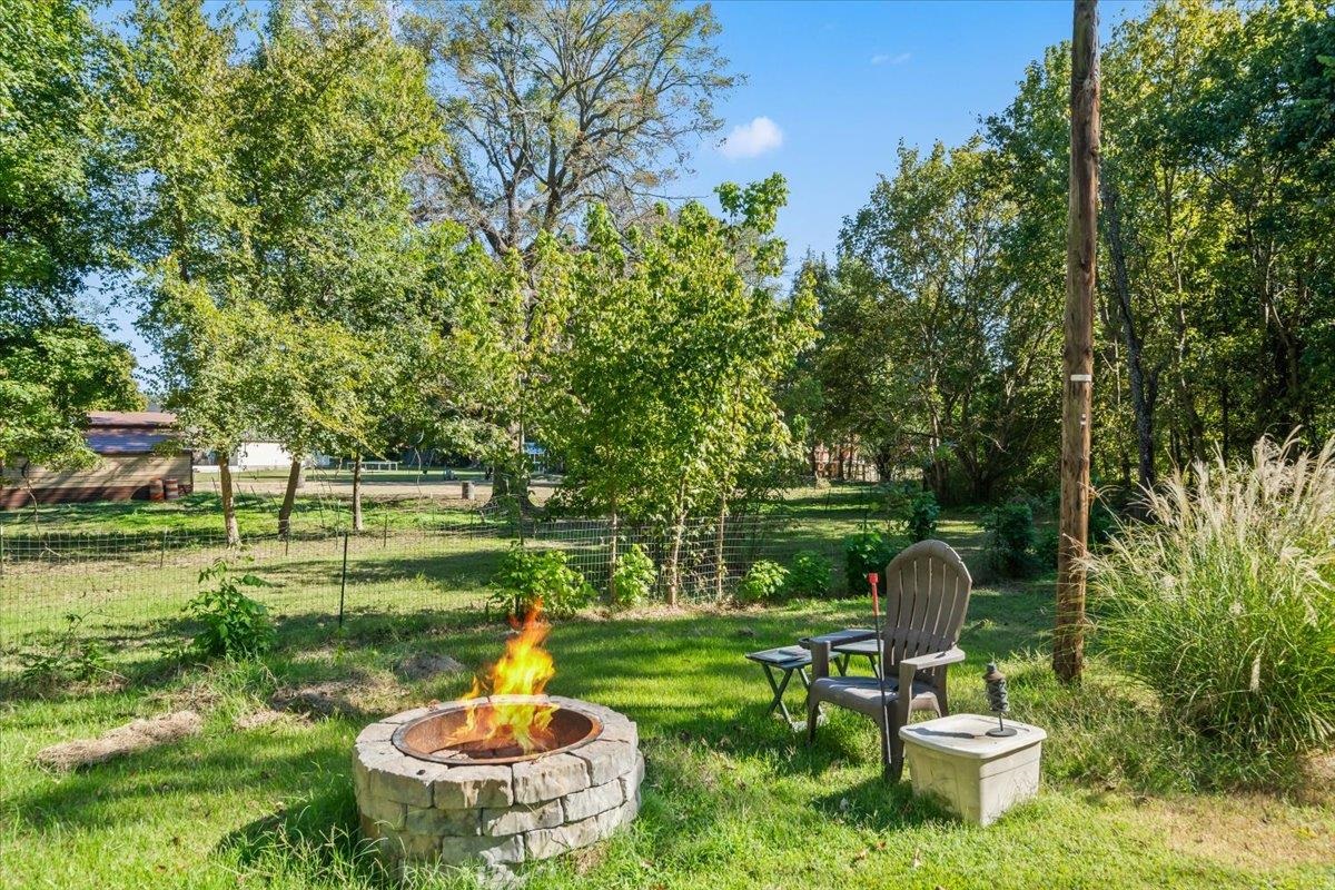 9301 Osborn Road Arlington, TN 38002 - Photo 21 of 31 a view of a chair and table in the garden