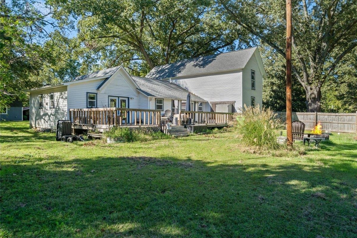 9301 Osborn Road Arlington, TN 38002 - Photo 23 of 31 a front view of a house with a garden and porch
